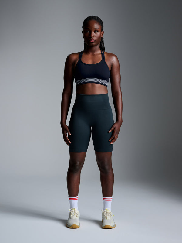 Becky wears size S-M is 5' 4" - Underband 29.5in, Bust 31.5in, Waist 28.5in, Hips 38in